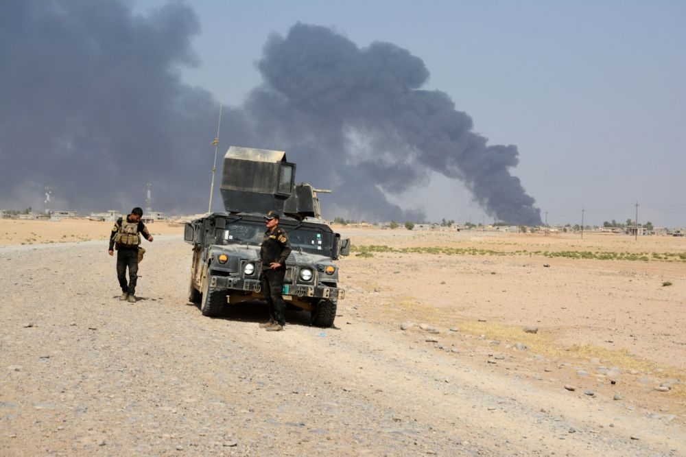 反伊斯蘭國的部隊在伊拉克摩蘇爾進行戰鬥。（湯森路透）