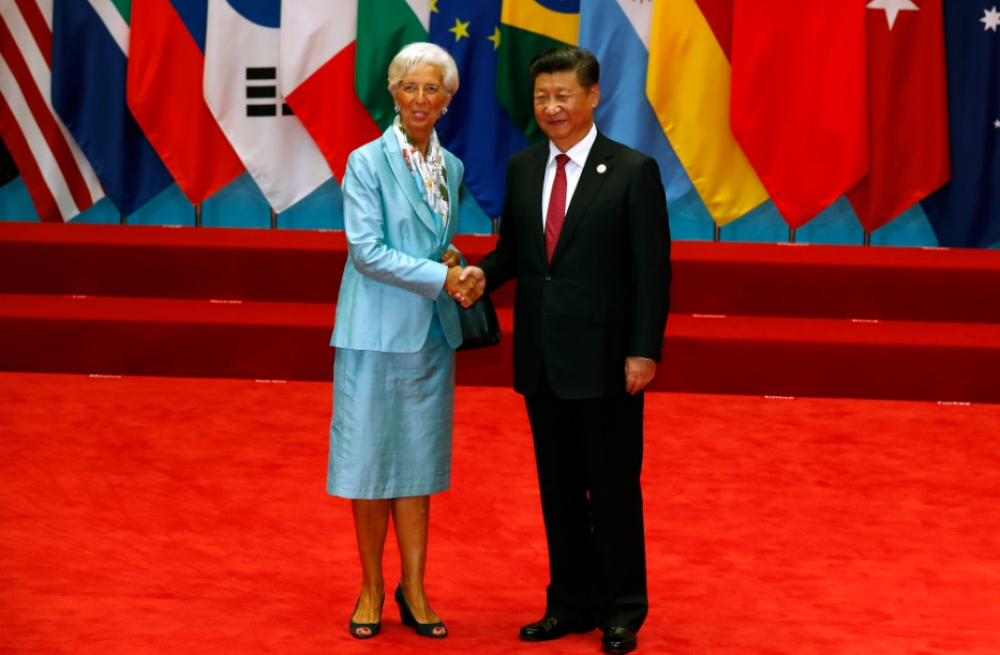 IMF總裁拉加德（左）4日與中國國家主席習近平於杭州的G20會場中會晤。（美聯社）