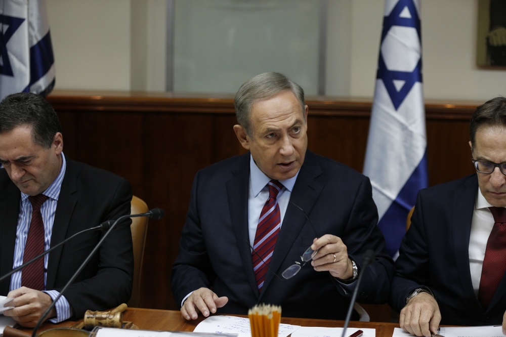 以色列總理納坦雅胡18日於內閣會議中。（美聯社）