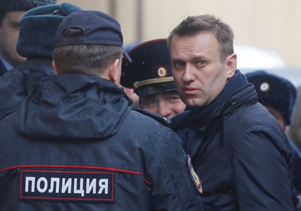 俄羅斯反對派領袖納瓦尼27日被警方帶走。（湯森路透）