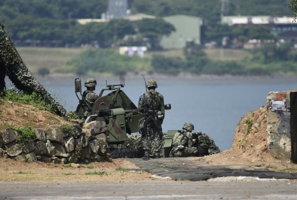 由關渡地區指揮部的機械化步兵營，在淡水河口進行反突擊與封鎖淡水河的操演。（攝影：李昆翰）