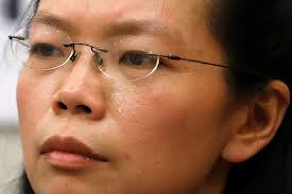 在中國被消失的NGO工作者，李明哲之妻李凈瑜透露，事發之後，有政壇友人勸她保持低調，「雖然不知道這些好友的話是個人想法，還是代表他們的部門」。（湯森路透）