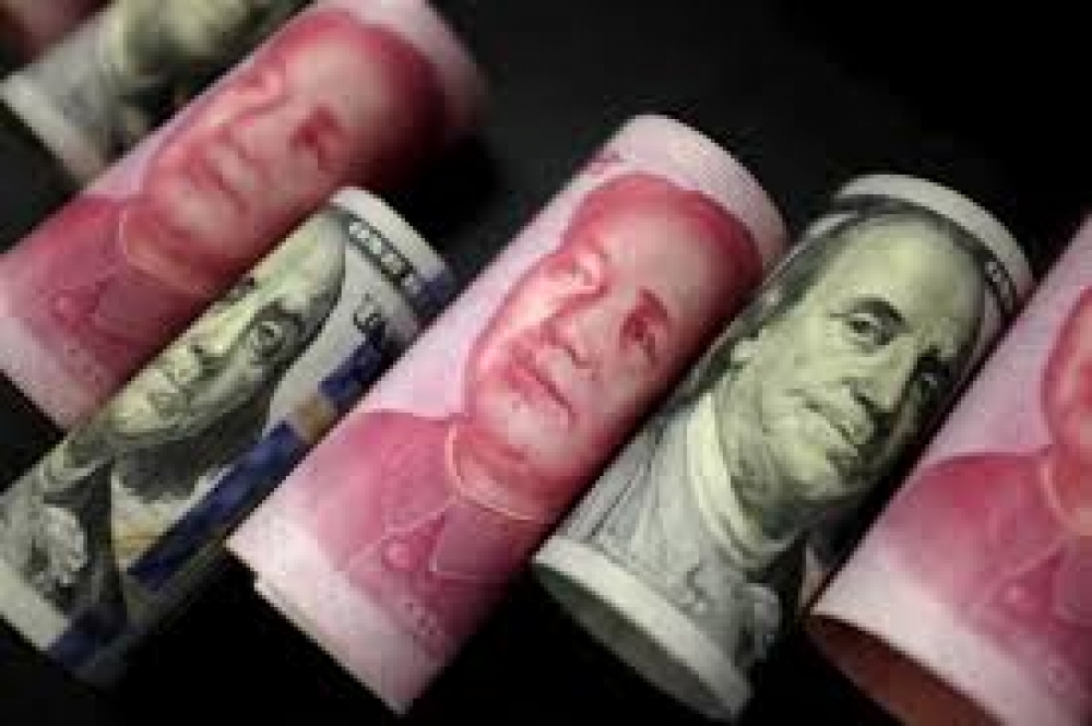 中國拋售美國債券以穩定人民幣匯率，導致日本成為美國第一大債權國。 （湯森路透）