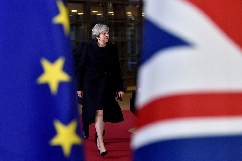 英國首相梅伊12日公布的脫歐計畫引發脫歐派不滿。（湯森路透）