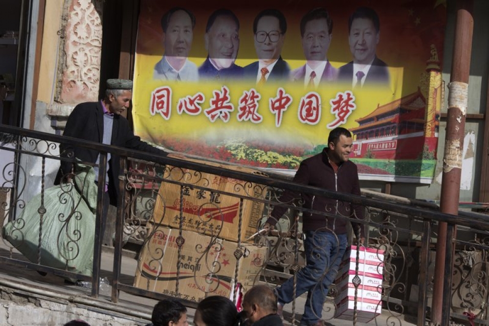 在西方社會看來，中國新疆的「完美控制」是「歐威爾式的噩夢」。（美聯社）