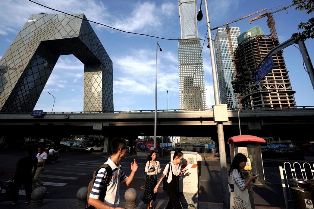 中國表示，領有居住證的台人在中國可與國人享有相同的公共服務與便利。（湯森路透）