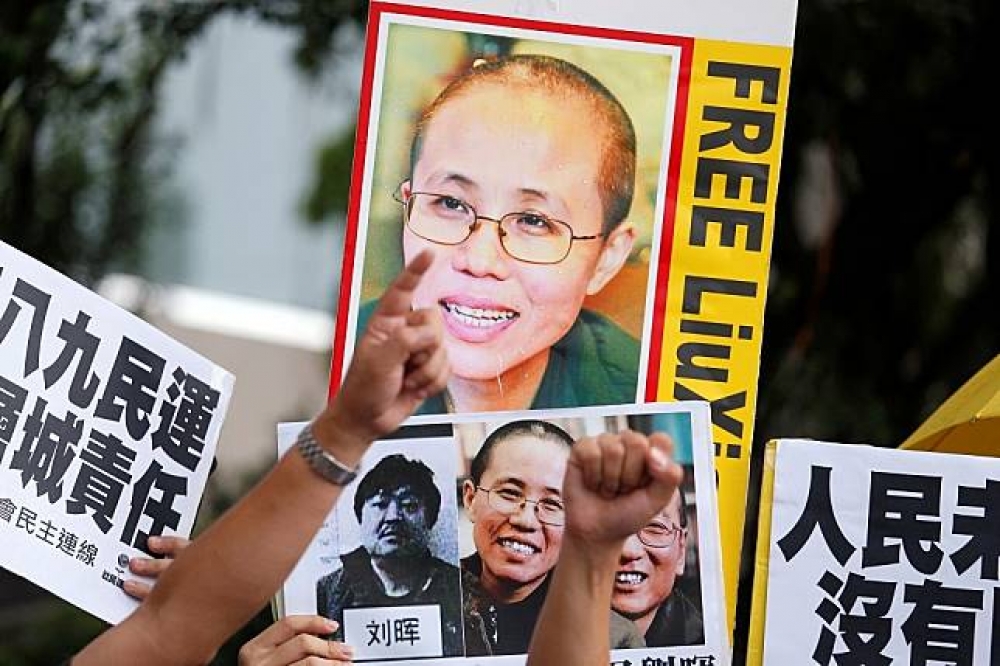 劉霞是中國已故諾貝爾和平獎得主劉曉波的遺孀，她目前一直被中國政府監控、遭到軟禁，外界想營救她的困難度很高。（湯森路透）

