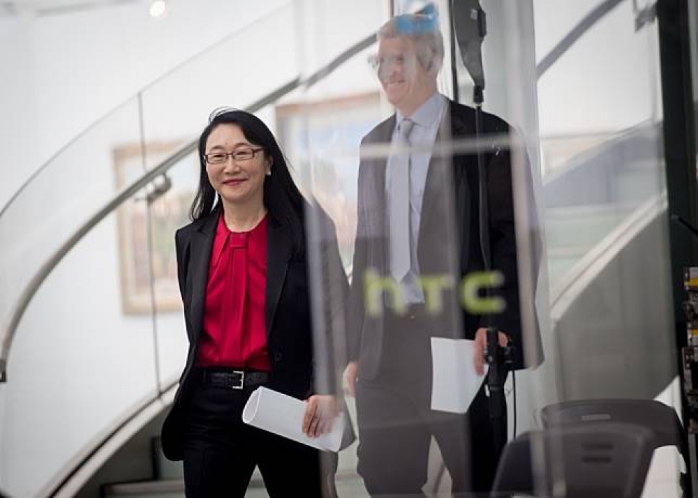 宏達電（HTC）卻宣布啟動組織優化政策，針對台灣製造部門擬縮減1,500 名員工，該計畫預計於9月底前執行完畢；左為宏達電董事長王雪紅。（攝影：李昆翰）