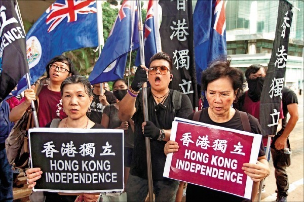 香港在20世紀的60年代，那個台灣在戒嚴，中國在文革的時代，已經有人主張建立獨立國家「香港」，因此不能說「港獨」是九七後才有的事。（美聯社）