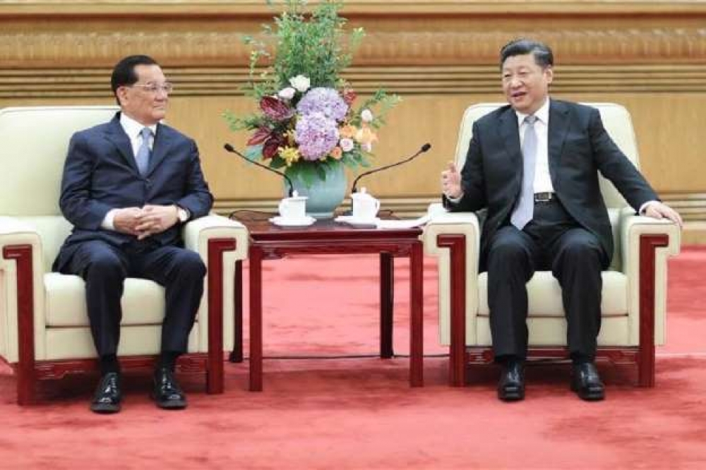 國民黨前主席連戰與中共領導人習近平會面時，提出「一中」主張，引發批評。（圖片取自CCTV）