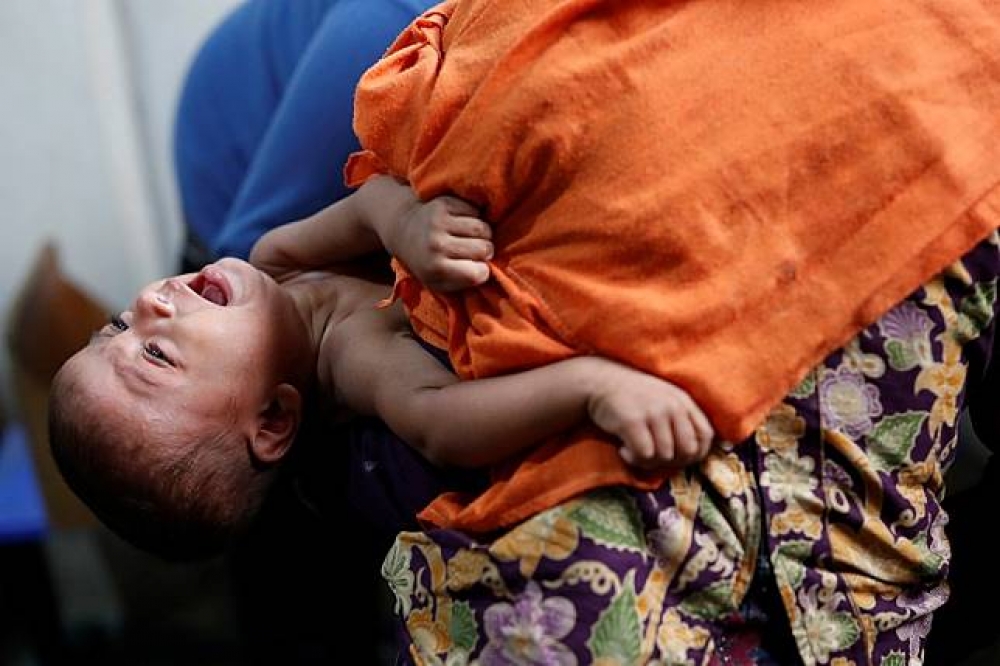 最近從緬甸逃出的羅興亞難民出現嚴重營養不良的情形。（湯森路透）