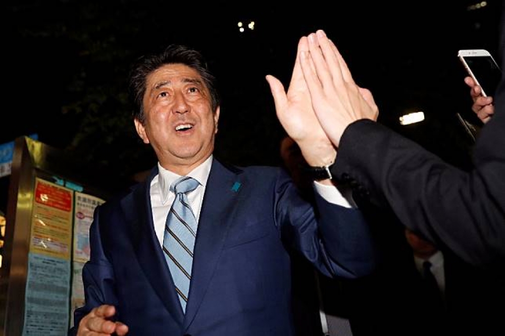 63歲的安倍晉三當選日本第98任首相，第四度組閣。（湯森路透）