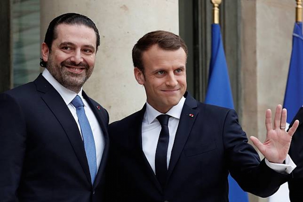 黎巴嫩前總理哈里里18日飛抵巴黎與法國總統馬卡洪會面。（湯森路透）