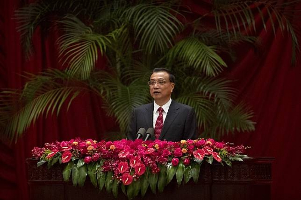 中國30晚間在北京人民大會堂舉行「十一國慶」招待會，李克強堅決反對「台獨」。（美聯社）