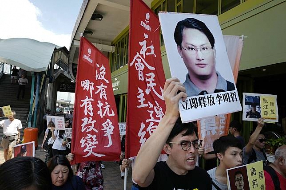 李明哲日前無預警從赤山監獄被移監到河北燕城監獄，20個台灣人權相關組織一同發布聲明抗議，要中國清楚交代移監原因。（美聯社）