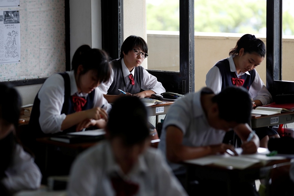 日本學童面臨多重壓力，自殺率創30年新高紀錄。（湯森路透）