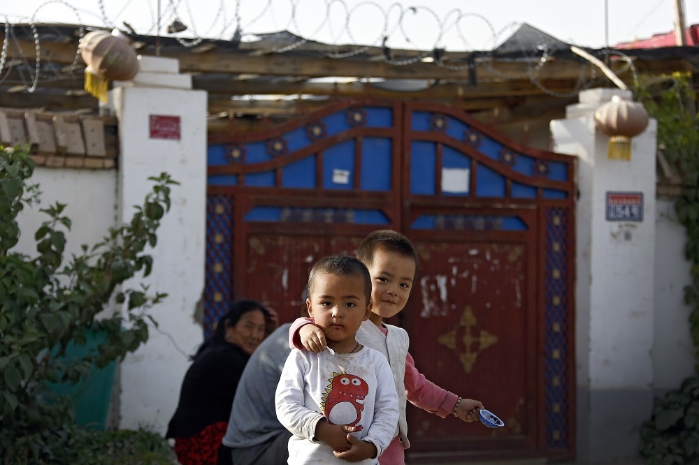 中國新疆維吾爾族正面臨政府迫害，語言與文化恐消失。（美聯社）