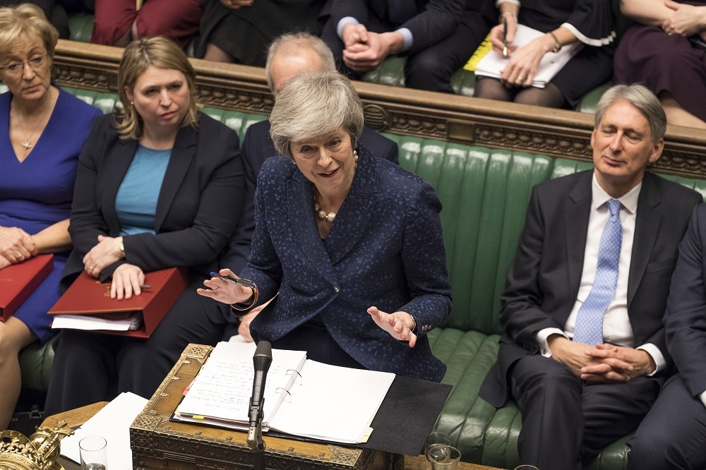 英國首相梅伊（Theresa May ）12日順利挺過自家保守黨的不信任案挑戰，保住大位。（湯森路透）