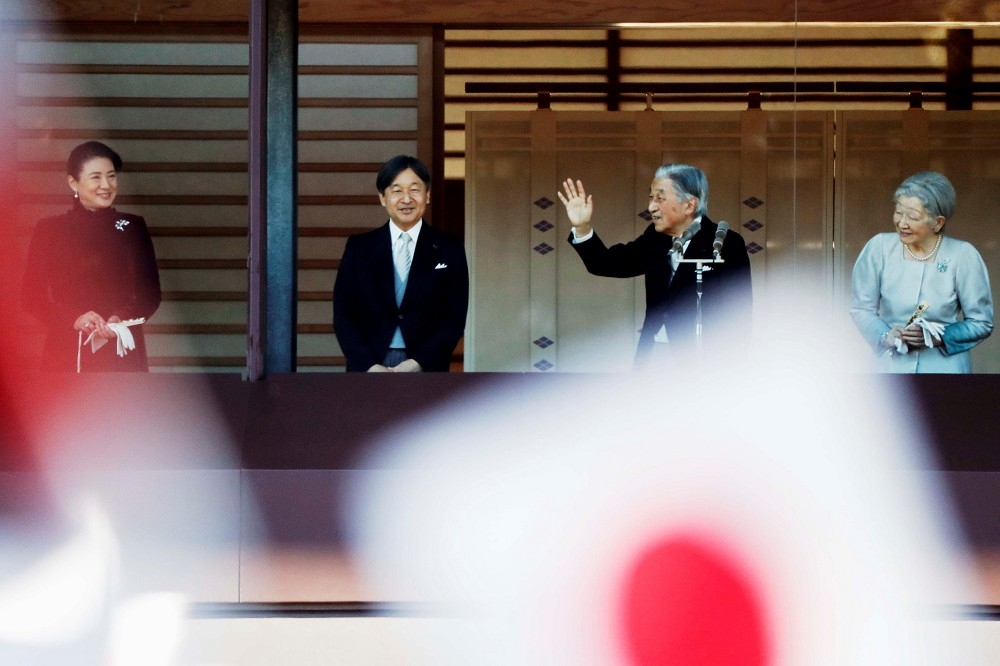日本明仁天皇夫婦與其他家族成員2日出席參加每年例行的賀年活動。（湯森路透）