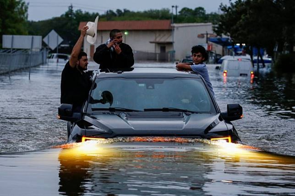 哈維颶風雨勢驚人，造成休士頓地區多處淹水。（湯森路透）