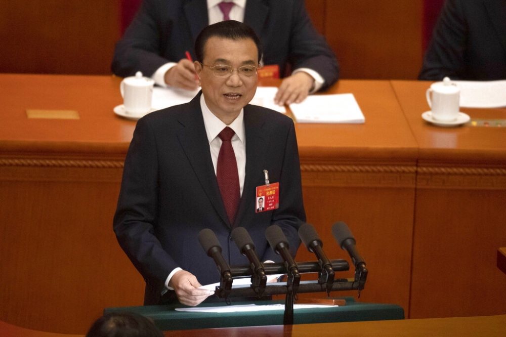 中國總理李克強15日舉行中外記者會。（AP）