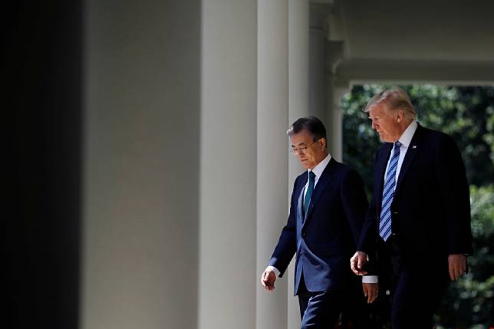 美國總統川普（Donald Trump）6月29日首次與南韓總統文在寅會面。（湯森路透）