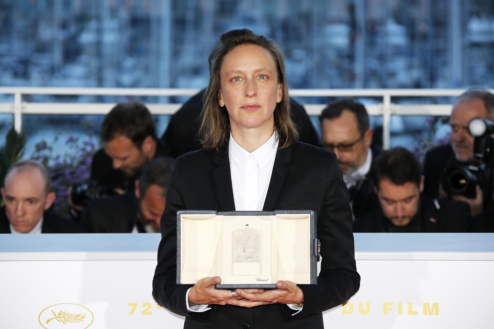 法國導演瑟琳席安瑪以《燃燒女人的畫像》拿下第72屆坎城影展正式競賽單元最佳劇本獎（湯森路透）