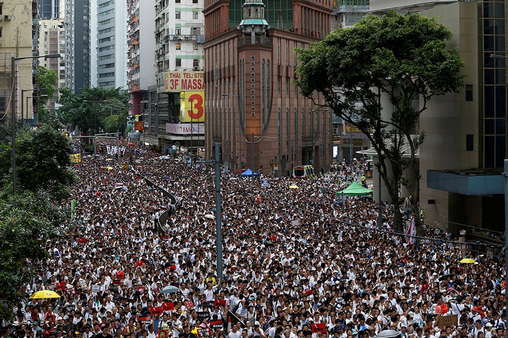 民陣稱參與9日反送中遊行人數超過103萬人。（湯森路透）