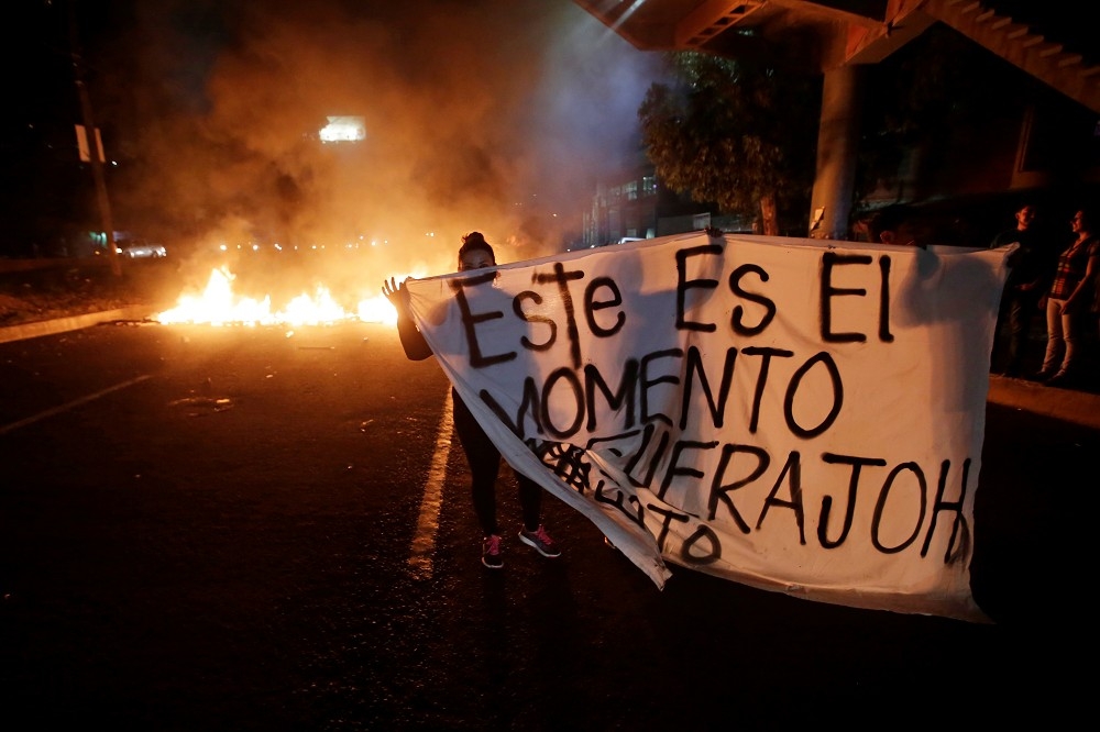 宏都拉斯民眾抗議政府提出的改革。（湯森路透）