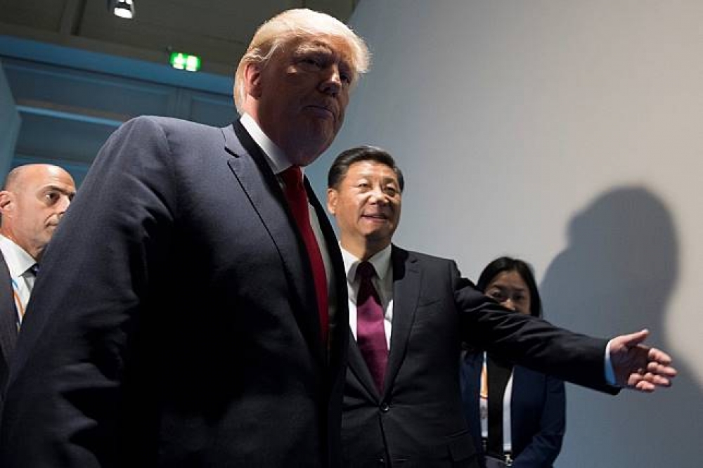 日前德國漢堡（Hamburg）所舉行的G20高峰會。左為美國總統川普，右為中國國家主席習近平。（湯森路透）