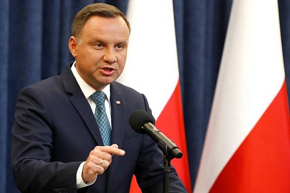 波蘭總統杜達24日於記者會上。（湯森路透）