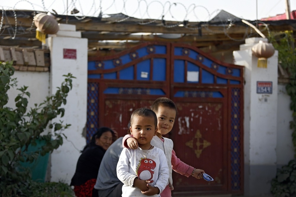 新疆維吾爾族孩童。（湯森路透）