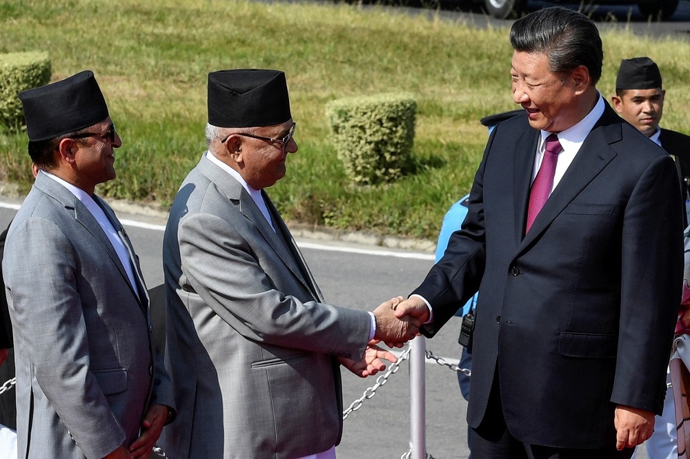 尼泊爾總理與習近平會晤。（湯森路透）