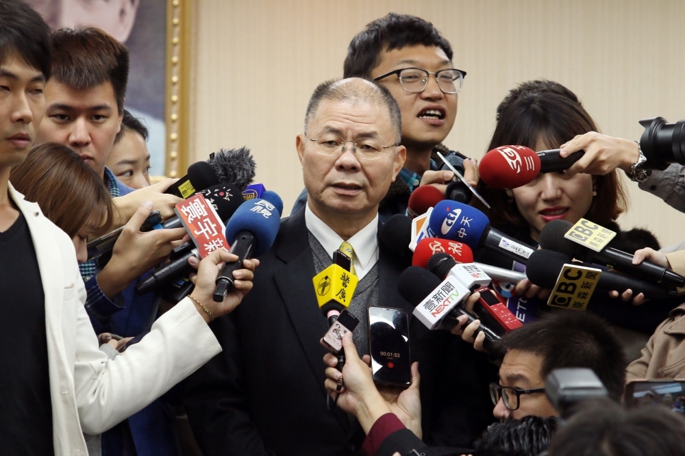 國民黨總統參選人韓國瑜隨扈遭爆涉入私菸案，國安局副局長胡木源表示，分組是抽籤決定。（王侑聖攝）