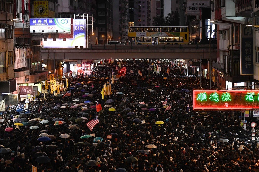 香港民陣8日發起國際人權日遊行。（湯森路透）