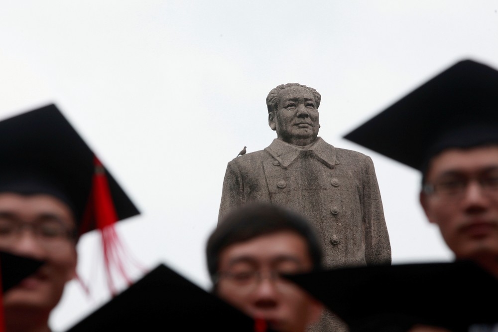 中國多所大學修訂學校章程，強調中國共產黨的核心理念。（湯森路透）