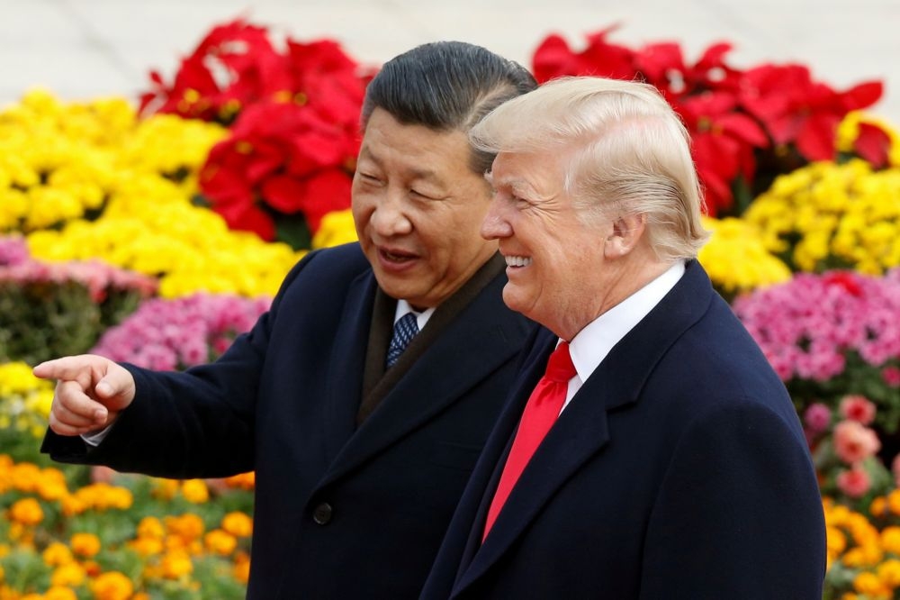 美國總統川普宣稱中美第一階段貿易協定將於15日簽署，圖為2017年11月9日川普訪問中國資料照。（湯森路透）