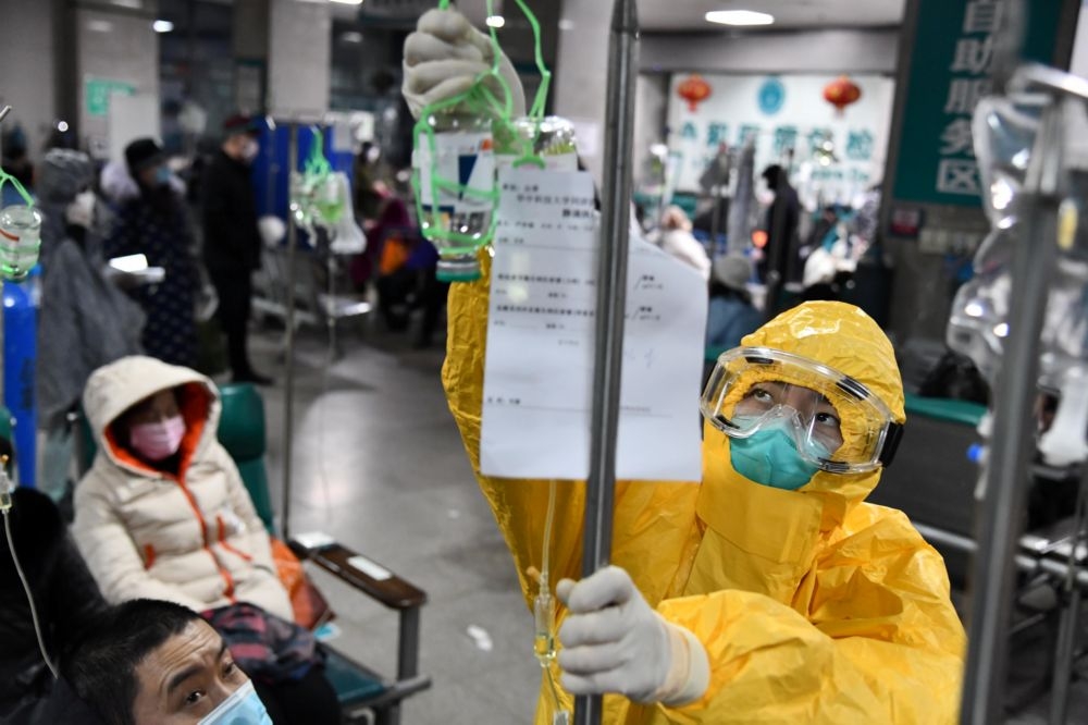 中國對外隱匿武漢肺炎疫情的做法早有先例。（湯森路透）