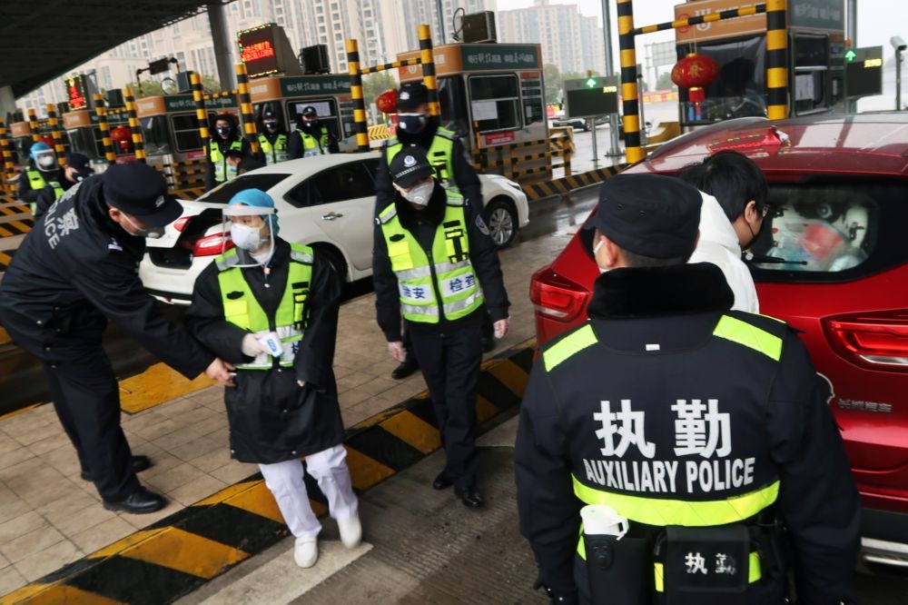 中國廣州市武漢疫情嚴重，7日宣布人車管制。（湯森路透）