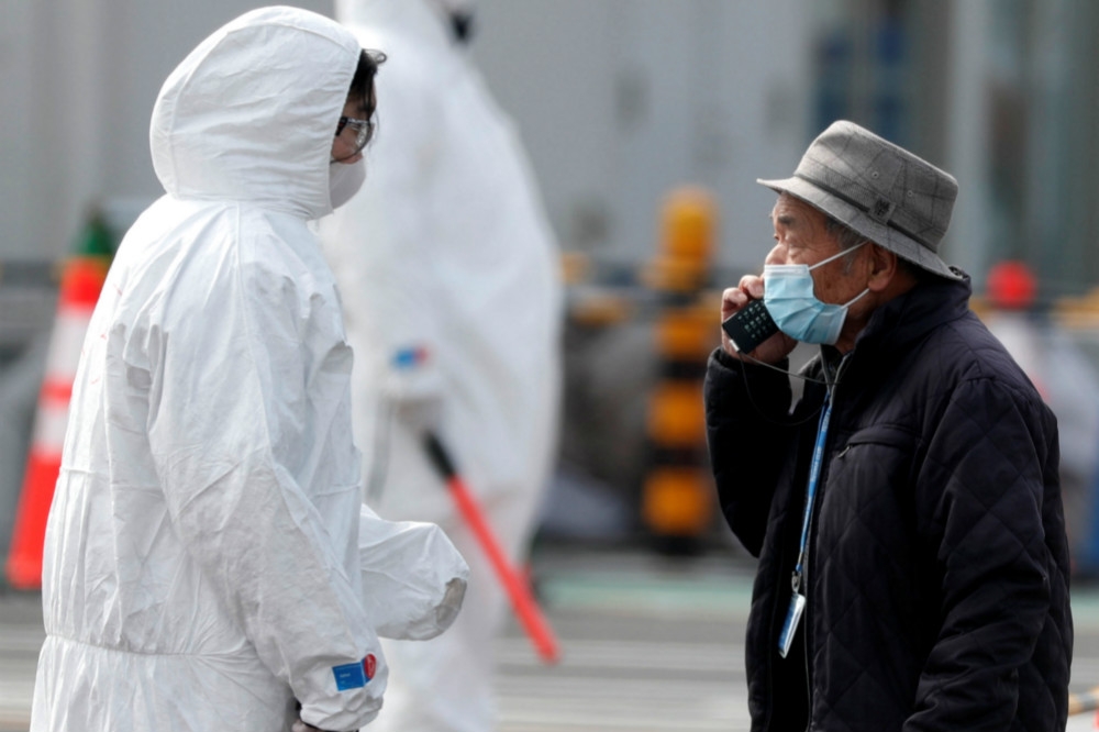 日本面臨新型肺炎疫情持續擴大，也讓該國觀光產業遭受嚴重衝擊。（湯森路透）