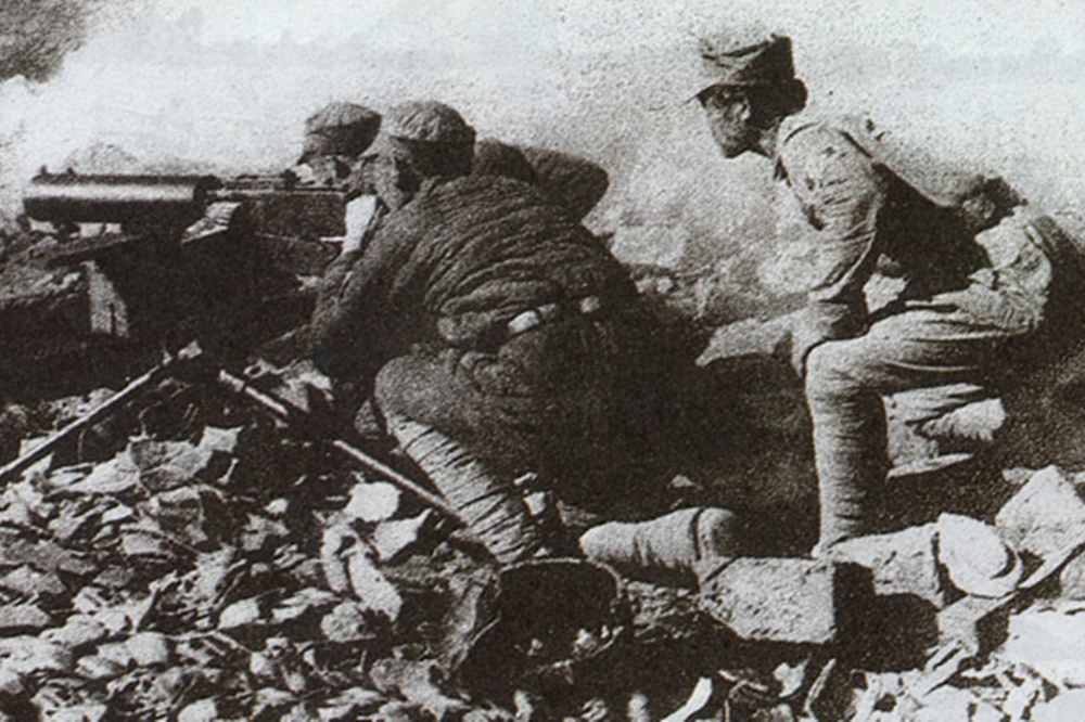 在武漢會戰中使用三十節式重機槍作戰的國民革命軍（圖片取自維基百科）
