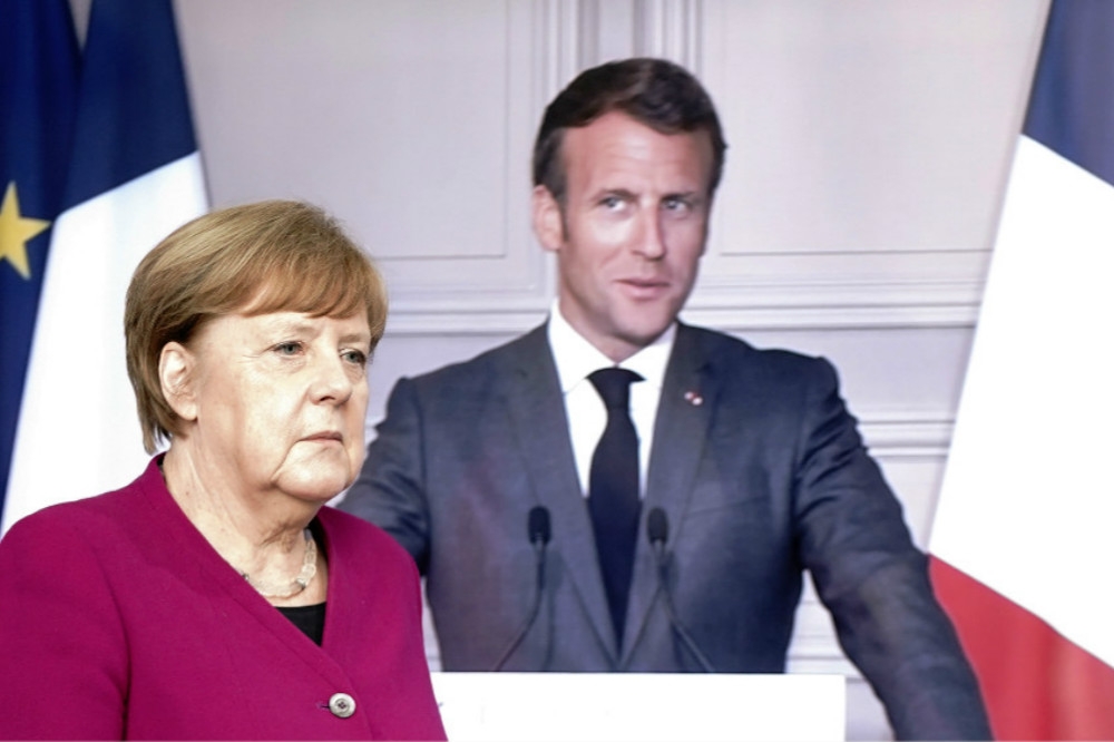 法國總統馬卡洪（右）與德國總理梅克爾（左）18日聯手推出「歐洲復興計畫」。（湯森路透）