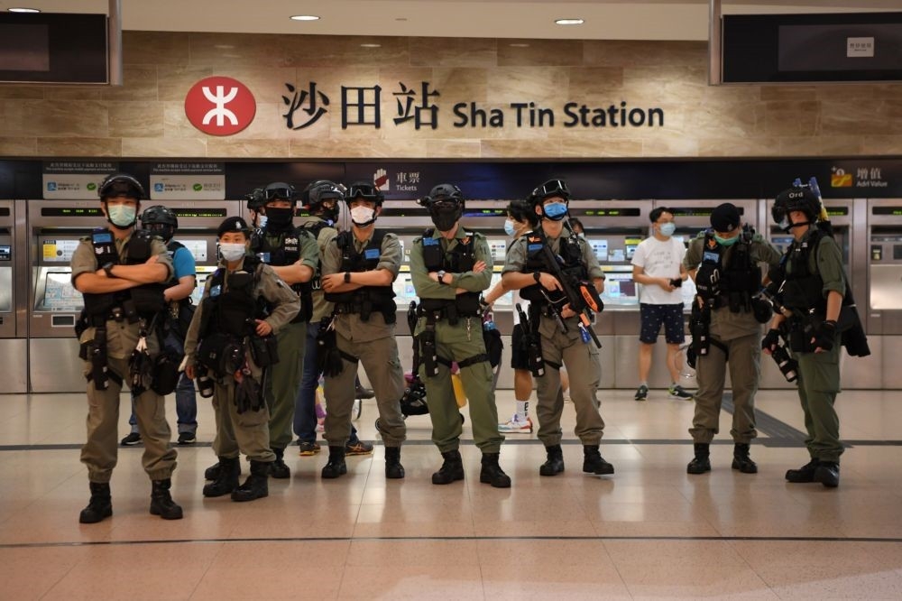 香港特區政府保安局局長李家超6月30日率6大主管宣示，強力執行港版國安法。（湯森路透）