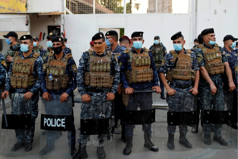 伊拉克警察執行維安任務。（湯森路透）