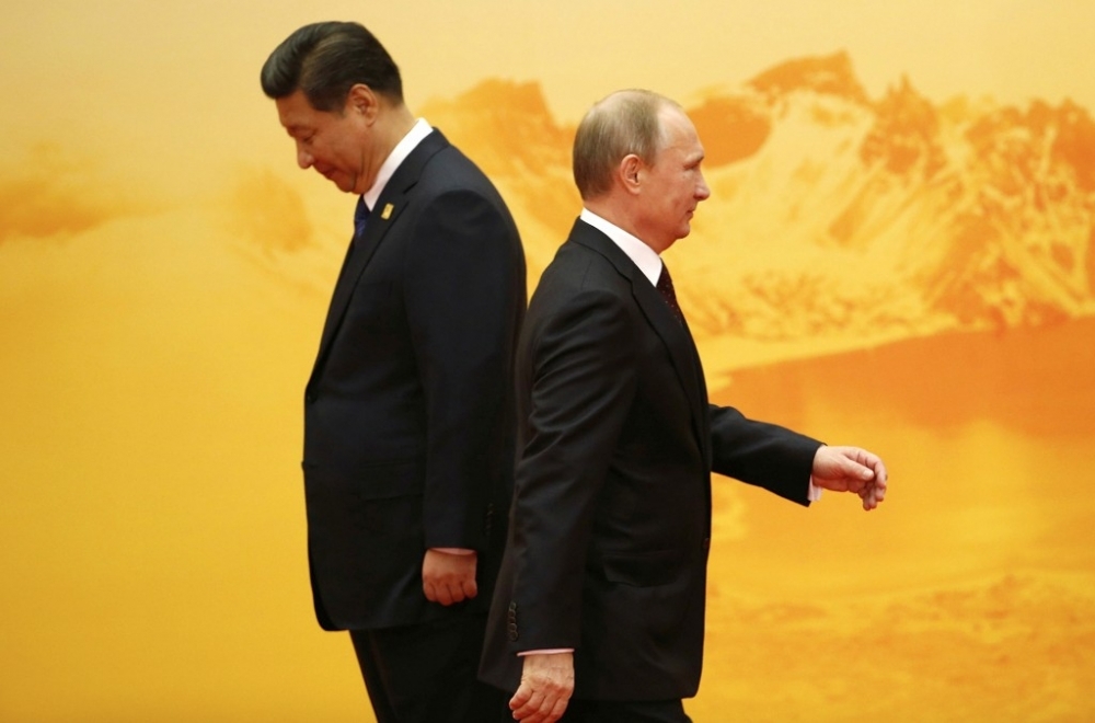 中國國家主席習近平（左）、俄羅斯總統普京（右）。（湯森路透）