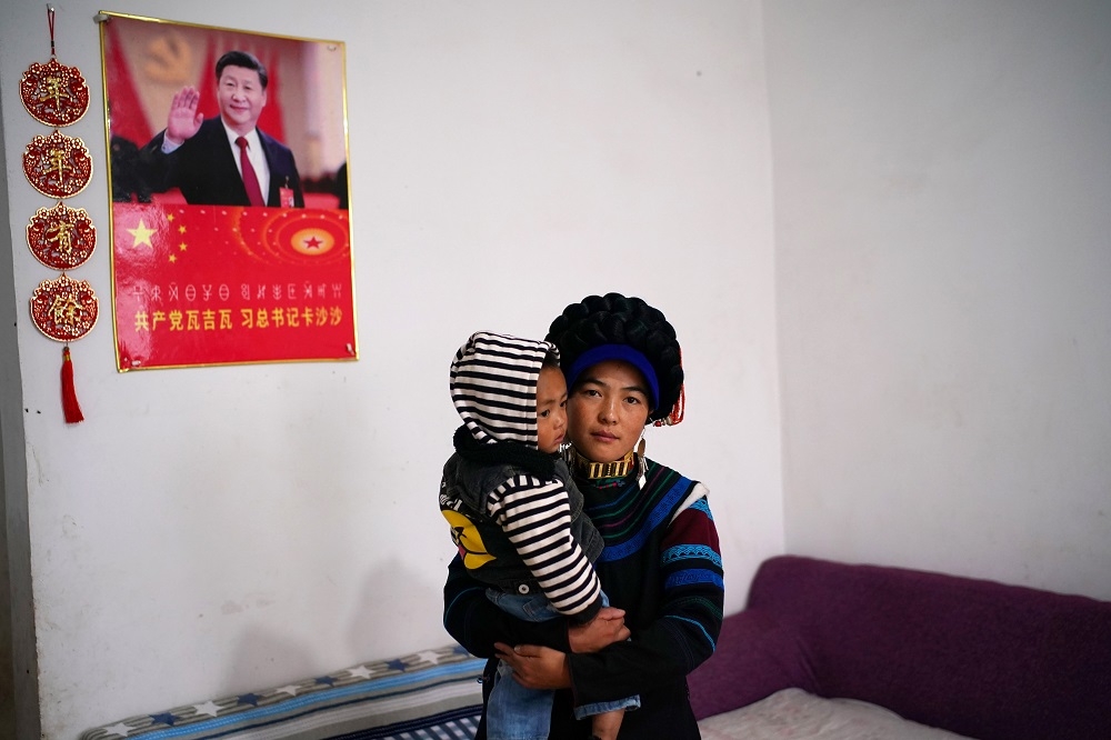 中國扶貧政策下的涼山彝族人。（湯森路透）