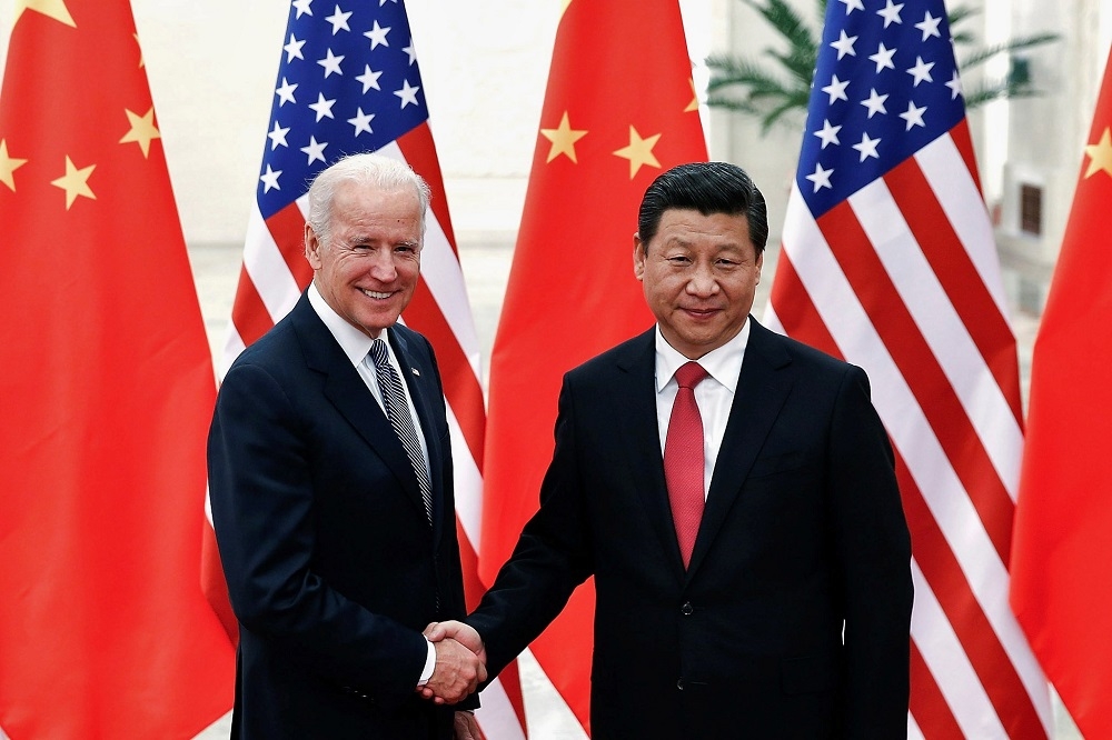 美國總統當選人拜登與中國國家主席習近平，2013年在北京人民大會堂會面資料照。（湯森路透）