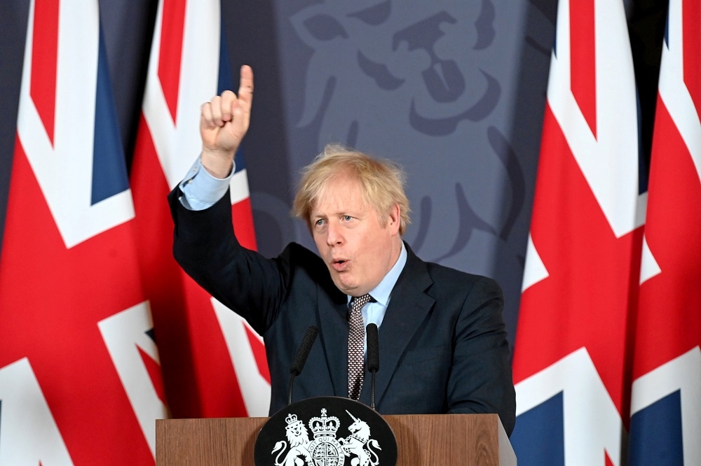 英國首相強森召開脫歐協議達成記者會。（湯森路透）