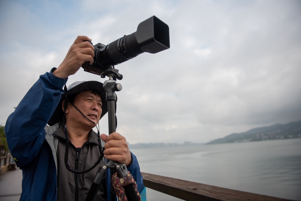 以透過鏡頭傳遞大自然的美為使命，許釗滂花了40年，終於完成台灣10個國家公園的影像紀錄。（蔣銀珊攝）