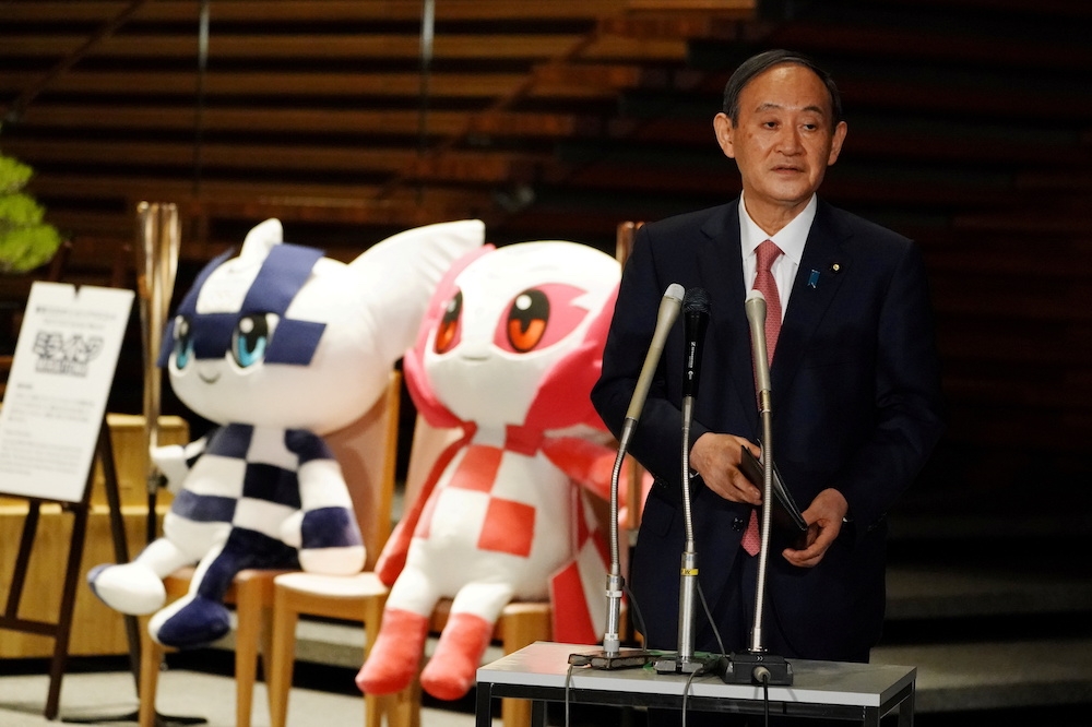 日本首相菅義偉因執意舉辦東京奧運面臨國會不信任投票。（湯森路透）